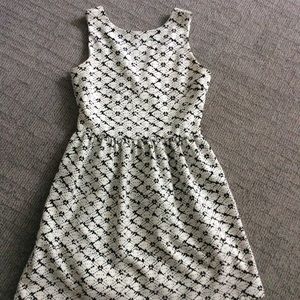 Sleeveless black & white dress.